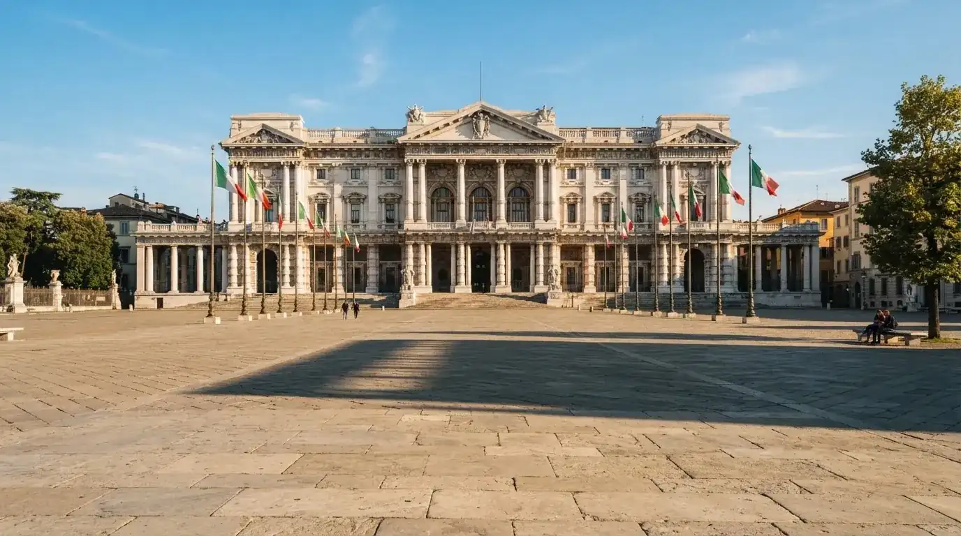 Palazzo istituzionale con bandiere al vento in una piazza soleggiata — big time gaming live casino italia